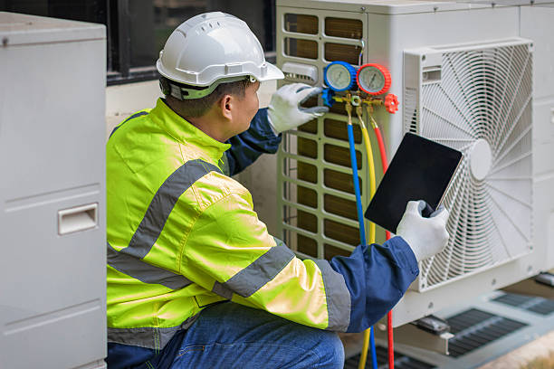 Professional Hvac technician working in Mountainburg, AR